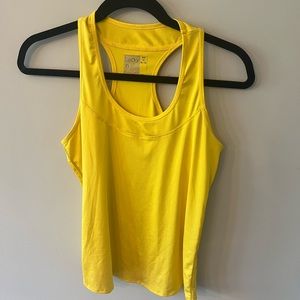 Lucky in love tennis tank. Size medium.